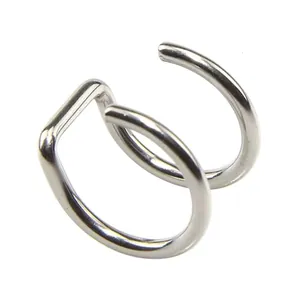 Detailed view of silver stainless steel double ring cartilage ear cuff on white background