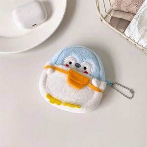 Detail of plush penguin coin purse featuring blue head and yellow mini backpack accessory