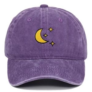 Close-up of moon and stars embroidery on a purple washed cotton baseball cap