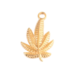 Detailed view of a gold leaf charm accessory with textured finish for jewelry making