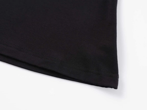 Close-up of black V-neck t-shirt hem showing high-quality double-needle stitching detail