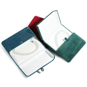 Velvet heart necklace gift boxes in dark green, red, and peacock blue with white padding