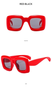 Front and side views of chunky square red kids sunglasses with dark lenses