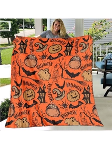 Halloween flannel throw blanket with festive pumpkin and ghost patterns for sofa decor.