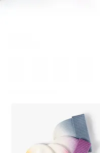 Detailed view of rib-knit texture on gradient ombre beanies in blue, purple, and pink