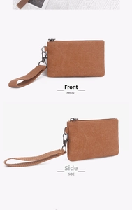 Front and side view of a brown washed canvas coin purse with lanyard and metal hook
