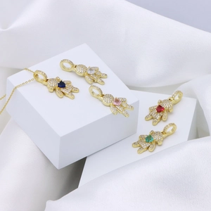 Gold-plated bear pendant necklace with colorful heart-shaped cubic zirconia crystals