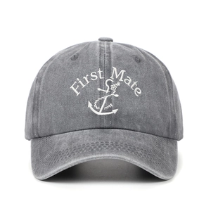 Detailed view of the First Mate embroidery and anchor on a vintage gray washed cotton cap