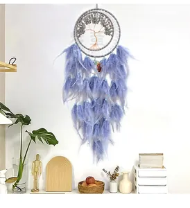 Detail of life tree dream catcher with purple feathers and blue beads for wall decor