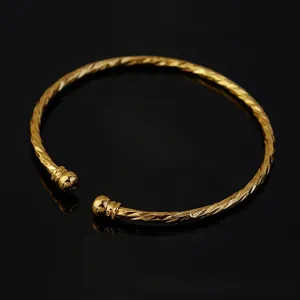 3mm Gold plated Ethiopian bridal bangle with twisted texture and round sphere ends
