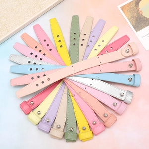 Multiple colorful faux leather wristbands for DIY phone cases in vibrant assorted tones