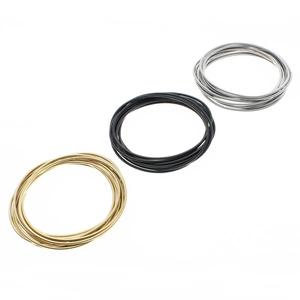 Minimalist 1.7mm stainless steel retractable spring bracelets in gold, black, and silver