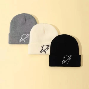 Three-pack knit beanies in grey white and black with embroidered planet logo