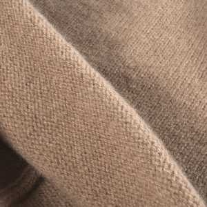 Soft brown merino wool knit beanie featuring fine texture and premium warm fabric