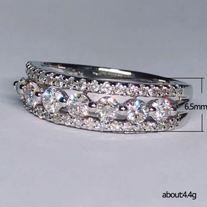 Three-row silver hollow ring with sparkling cubic zirconia, 6.5mm width and 4.4g weight