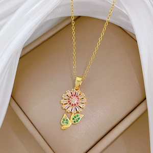 Luxurious gold sunflower pendant necklace with white red and green cubic zirconia stones