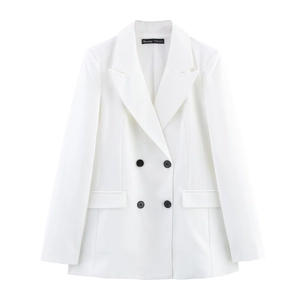 Flat lay of a white double-breasted blazer with four black buttons and shoulder pads