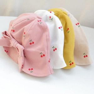 Cute baby sun hats in four colors with cherry print and bow detail for toddler girls