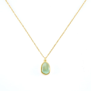 Detail of green irregular natural stone pendant on 18k gold plated titanium chain