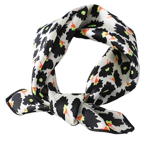 Elegant silk scarf with leopard print and orange accents on a white background