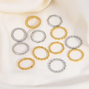 Set of 11 minimalist bamboo and rope textured stackable rings in gold and silver finish