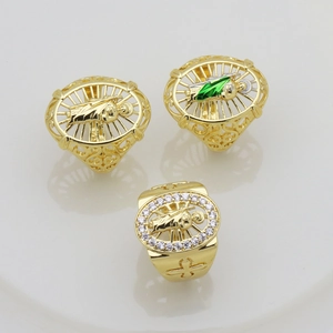 Set of three golden hollow heart rings with green enamel and sparkling zircon accents