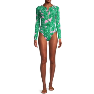Detailed front view of long sleeve swimsuit with green tropical print and waist belt