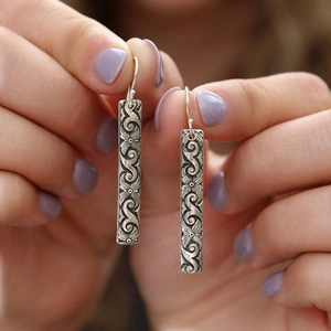 Vintage geometric engraved drop earrings in antique silver finish with floral motifs