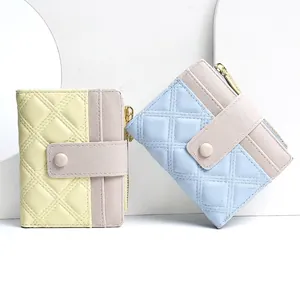 Quilted mini wallet for women featuring colorblock PU leather and secure snap closure