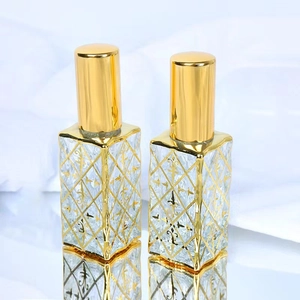 Elegant 12ml glass perfume spray bottles with gold diamond grid and iris flower patterns