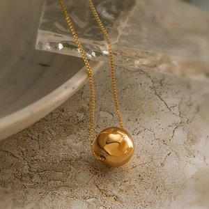 Minimalist gold plated ball pendant necklace for women with polished finish