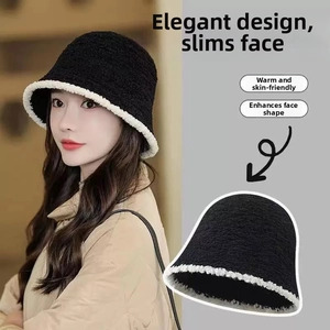 Detail of black knit beanie with white plush trim and thick winter lining for women