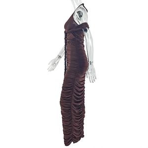 Detail of the side ruching on a dark brown bodycon halter neck maxi dress for women