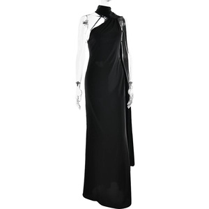 Detail of slim fit black maxi dress featuring a chic one-shoulder halter neckline