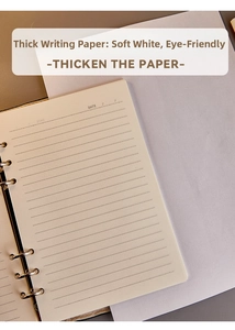 Detail of A5 vintage denim binder notebook showing thick cream-colored lined paper
