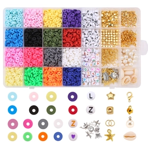 Detail of 4000pcs clay beads set including letter beads and gold metal pendants in 24 grids