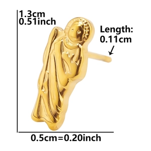 Macro detail of golden saint religious earring with dimensions 1.3cm in height and 0.5cm width
