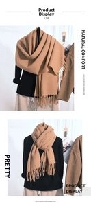 Close-up of camel tassel scarf featuring colorful polka dot patterns and soft texture