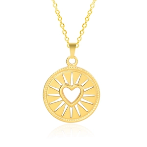 Macro shot of 18k gold plated stainless steel heart pendant with textured round border