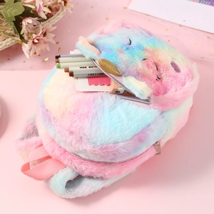 Close-up of rainbow plush unicorn backpack with soft texture and zippered storage