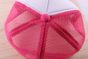 Detail of pink mesh fabric and white crown stitching on a minimalist sun hat
