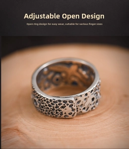 Macro view of adjustable open ring featuring rustic meteorite texture and vintage finish
