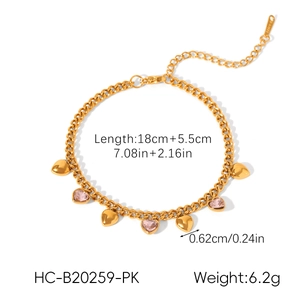 Detail view of gold butterfly bracelet with pink heart stones and S-STEEL clasp engraving