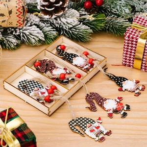 Christmas wooden gnomes ornaments set with plaid patterns, twine, and storage box