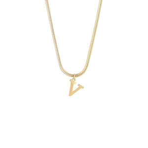 Macro detail of gold 18K stainless steel snake chain with a minimalist letter V pendant