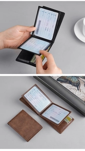 Detail view of leather driver's license wallet with transparent ID window in black and brown