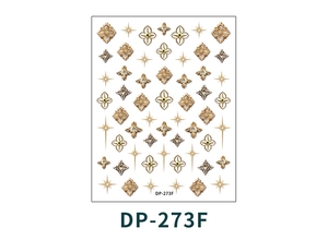 Macro detail of DP-273F 3D nail art stickers featuring gold and silver baroque patterns