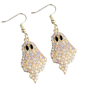 Detail of gold ghost earrings with colorful rhinestones and black oval eyes