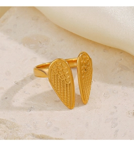 Macro shot of 18K gold plated wing ring featuring detailed feather textures on stone