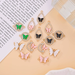 Detailed assortment of colorful enamel butterfly pendants with rhinestones for DIY jewelry